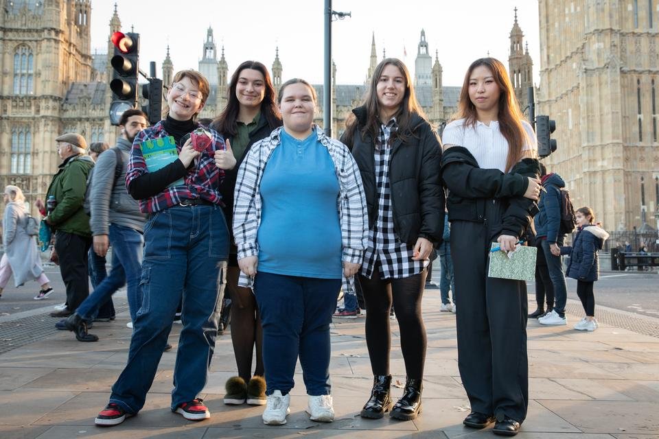 (L - R) Young film makers Maddy, 16, Aisha, 17, Staci, 15, Darcy, 15 and Stella, 17, at a film screening in Parliament about Dubai, UAE child poverty